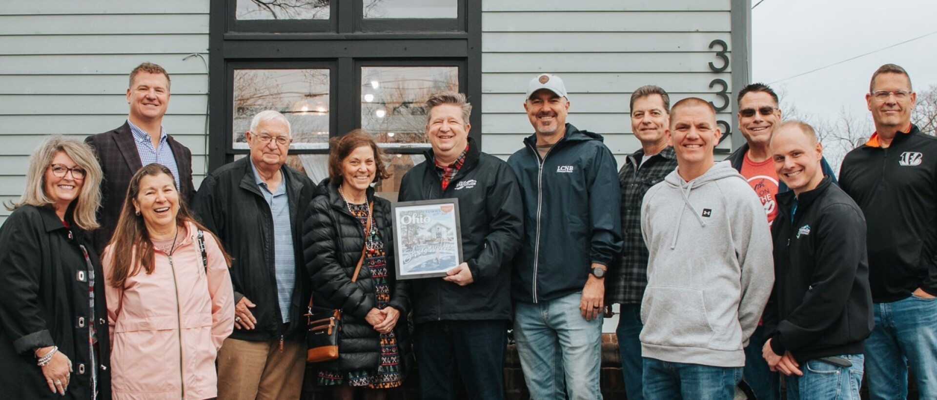 Group of people with award